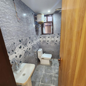 Bathroom in 2 BHK Builder Floor at Chattarpur – for Rent