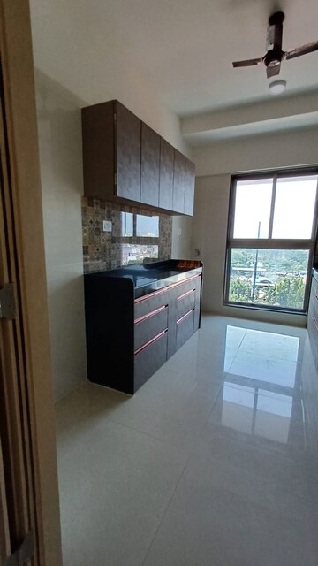 Kitchen in 3 BHK Apartment at Rajesh Raj Infinia, Malad West – for Rent