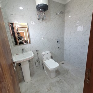 Bathroom in 2 BHK Builder Floor at Chattarpur – for Rent