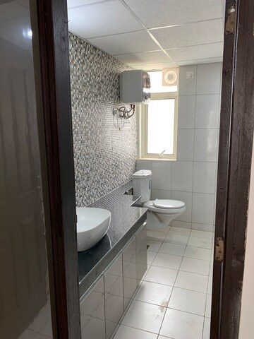 Bathroom in 3 BHK Apartment at Lotus Panache, Sector 110 – for Rent