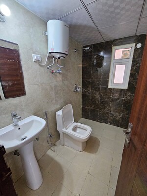 Bathroom in 2 BHK Apartment at SG Shikhar Height, Siddharth Vihar – for Rent