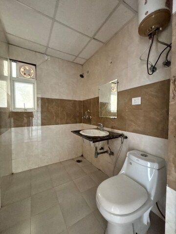 Bathroom in 2 BHK Apartment at Supertech Cape Town, Sector 74 – for Sale