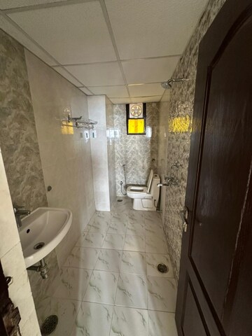 Bathroom in 2 BHK Apartment at Jankipuram – for Rent