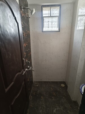 Building Lobby in 1 BHK Apartment at Wadgaon Sheri – for Rent