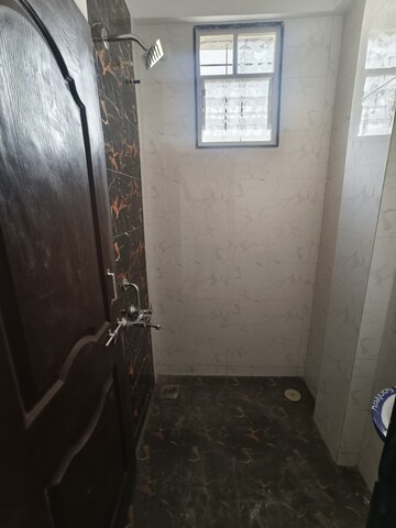 Building Lobby in 1 BHK Apartment at Wadgaon Sheri – for Rent