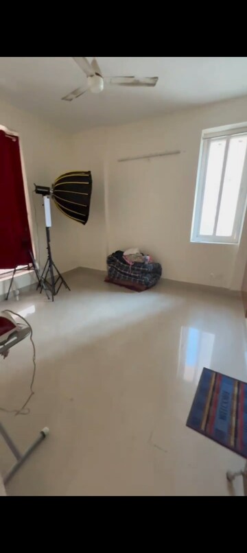 Living Room in 2 BHK Apartment at Sikka Karmic Greens, Sector 78 – for Rent