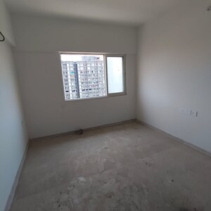 Room in 2 BHK Apartment at Omkar Signet, Malad East – for Rent