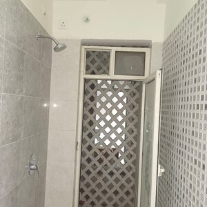 Bathroom in 2 BHK Apartment at Omkar Signet, Malad East – for Rent