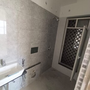 Bathroom in 2 BHK Apartment at Omkar Signet, Malad East – for Rent