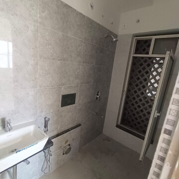 Bathroom in 2 BHK Apartment at Omkar Signet, Malad East – for Rent
