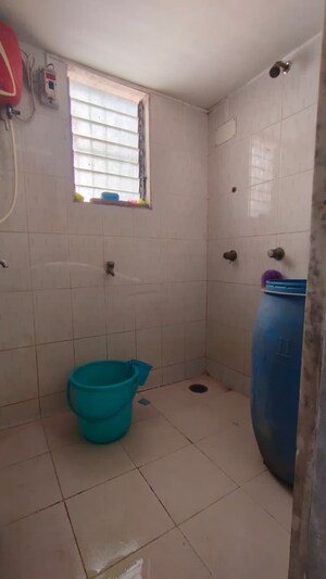 Bathroom in 1 BHK Apartment at Gulmohar Chs, Vasant Vihar – for Rent