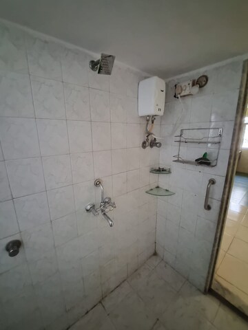 Bathroom in 2 BHK Apartment at Green Acres Apartment, Waghbil – for Rent