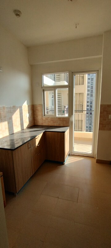 Kitchen in 4 BHK Apartment at Amrapali Crystal Homes, Sector 76 – for Sale