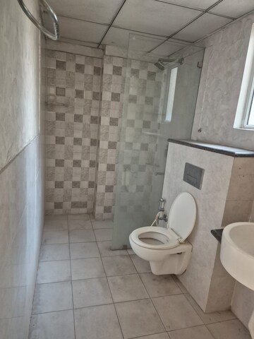Bathroom in 3 BHK Apartment at Gaurs Cascades, Raj Nagar Extension – for Rent