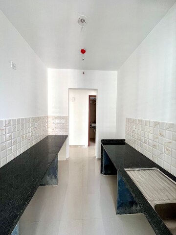 Kitchen in 3 BHK Apartment at Kalpataru Immensa, Kolshet Road – for Sale