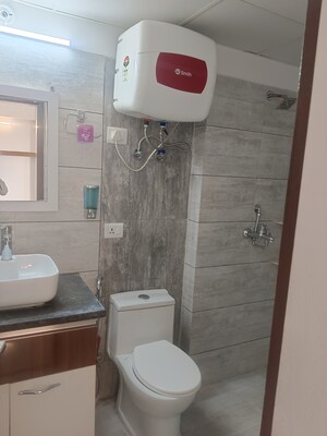 Bathroom in 3 BHK Apartment at Gulshan Bellina, Sector 16 Greater Noida – for Rent