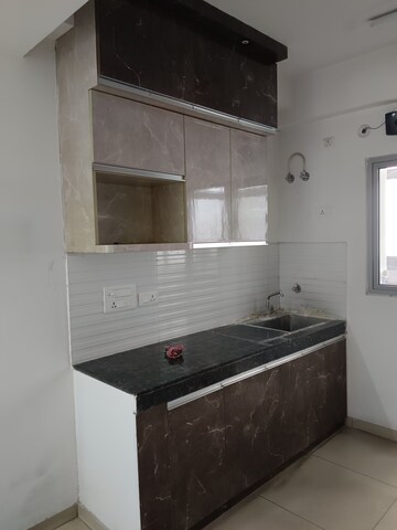 Kitchen in 3 BHK Apartment at Gulshan Bellina, Sector 16 Greater Noida – for Rent