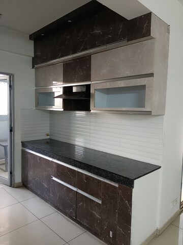 Kitchen in 3 BHK Apartment at Gulshan Bellina, Sector 16 Greater Noida – for Rent