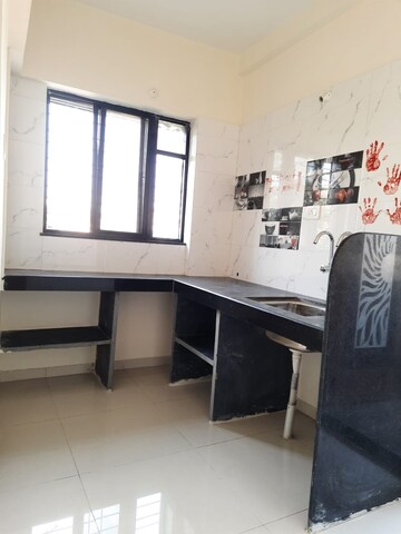 Kitchen in 1 BHK Apartment at Wadgaon Sheri – for Rent