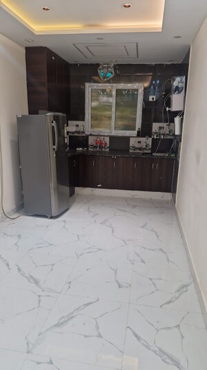 Kitchen in 2 BHK Apartment at Mahagun Mansion I and II, Vaibhav Khand – for Rent