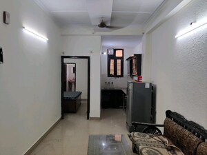 Living Room in 2 BHK Apartment at Mahagun Mansion I and II, Vaibhav Khand – for Rent