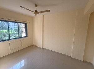 Room in 1 BHK Apartment at Puraniks Kavya Dhara CHS, Dhokali – for Rent