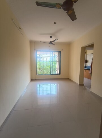 Room in 1 BHK Apartment at Puraniks Kavya Dhara CHS, Dhokali – for Rent