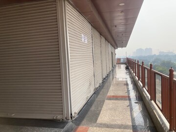 Balcony in  Shop at Saviour Lord Krishna Mart, Sector 19 Yamuna Expressway – for Sale