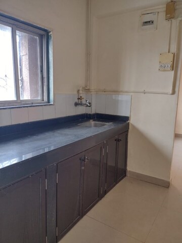 Kitchen in 1 BHK Apartment at New Mhada Tower, Malad West – for Rent