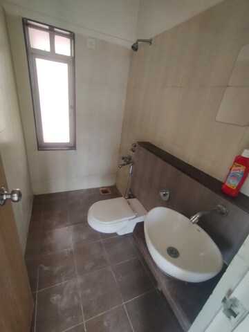 Bathroom in 1 BHK Apartment at Puraniks Tokyo Bay Phase 2, Kasarvadavali – for Rent
