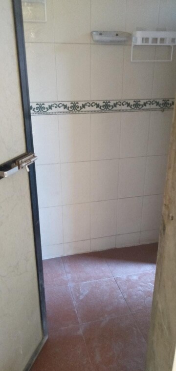 Bathroom in 1 BHK Apartment at Cosmos Residancy, Kavesar – for Rent