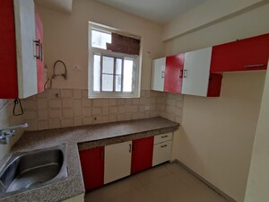 Kitchen in 2 BHK Apartment at Mona Greens, Ghazipur – for Rent