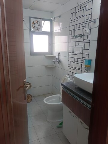 Bathroom in 3 BHK Apartment at Gulshan Bellina, Sector 16 Greater Noida – for Rent
