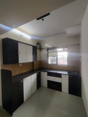 Kitchen in 1.5 BHK Apartment at Rosa Gardenia, Ghodbunder Road – for Rent