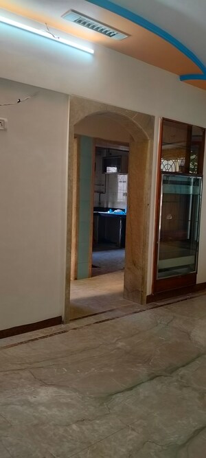 Building Lobby in 1 BHK Apartment at Suryodaya Apartments, Seawoods Sector 48 – for Rent