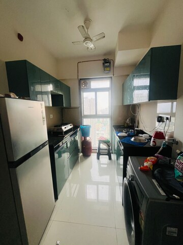 Kitchen in 2 BHK Apartment at Runwal Nirvana, Parel – for Rent