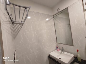 Bathroom in 2 BHK Apartment at Omkar Ananta, Goregaon East – for Rent