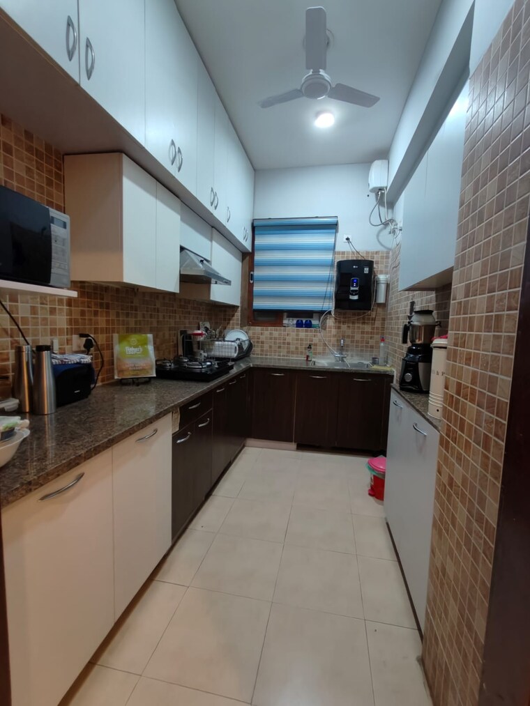 Kitchen, umang-winter-hills 2.5 Bedroom 1616 Sq.Ft. Apartment In Sector 77 Gurgaon 9694725