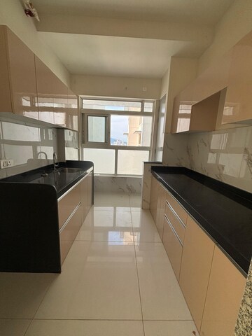 Kitchen in 2.5 BHK Apartment at Wadhwa Atmosphere O2, Mulund West – for Sale