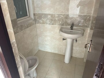 Bathroom in 3 BHK Apartment at Amrapali Princely Estate, Sector 76 – for Sale