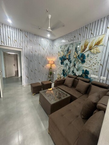 Living Room in 1 BHK Apartment at DAH Greentech NX One, Tech Zone 4 Greater Noida – for Rent