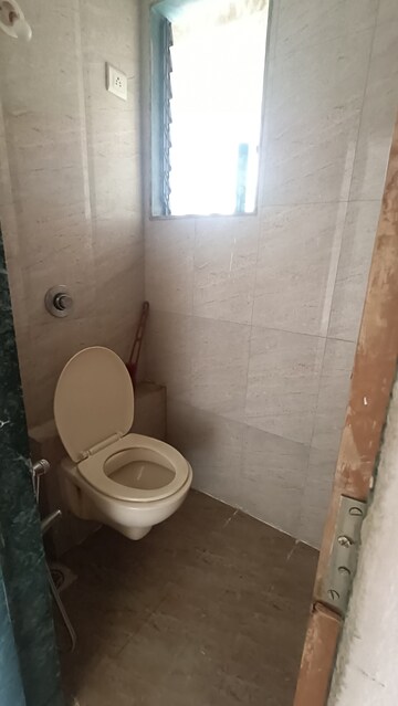 Bathroom in 1 BHK Apartment at Kanchan Pushp Society, Ghodbunder Road – for Rent