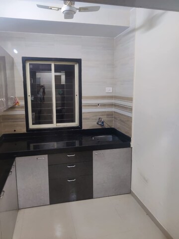 Kitchen in 1 BHK Apartment at Kanchan Pushp Society, Ghodbunder Road – for Rent