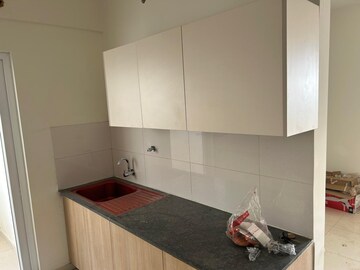 Kitchen in 2 BHK Apartment at Godrej Aqua, International Airport Road – for Sale