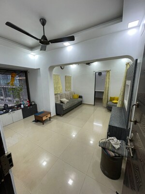 Living Room in 2 BHK Apartment at Bhagya Nagar CHSL, Mahim West – for Rent