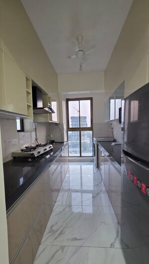 Kitchen in 2 BHK Apartment at Raymond Ten X Habitat, Pokhran Road No Two – for Rent