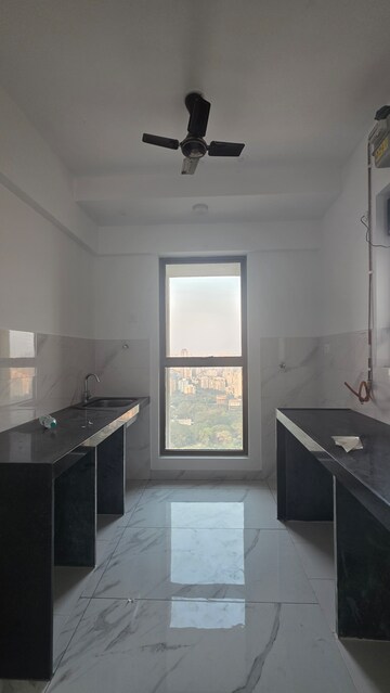 Kitchen in 1.5 BHK Apartment at Raymond Ten X Habitat, Pokhran Road No Two – for Rent