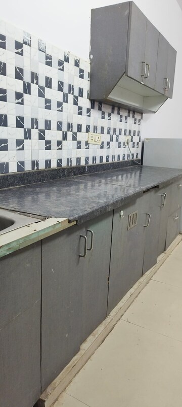 Kitchen in 1 RK Builder Floor at DLF City Phase III, Sector 24 – for Rent
