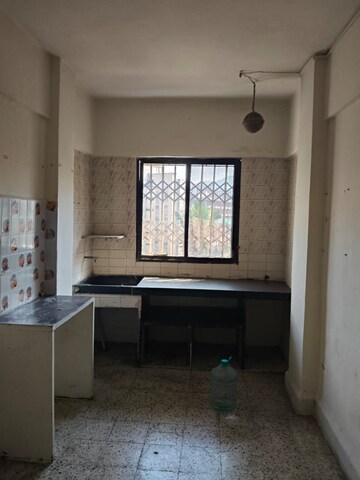 Kitchen in 1 RK Apartment at Sai Kripa Complex, Kashimira – for Sale