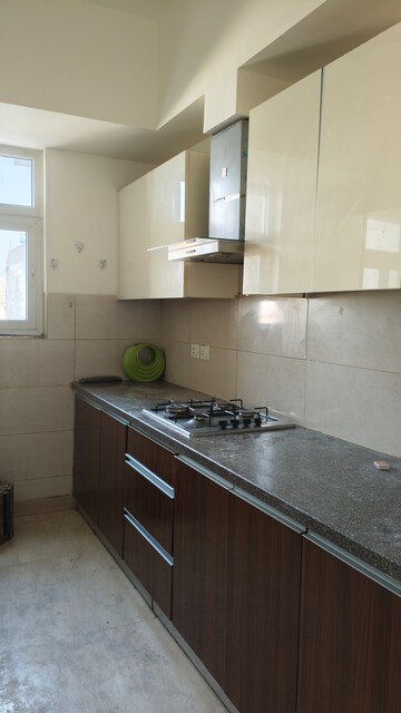 Kitchen in 3 BHK Apartment at Puri Anand Villas Phase II, Sector 81 – for Rent